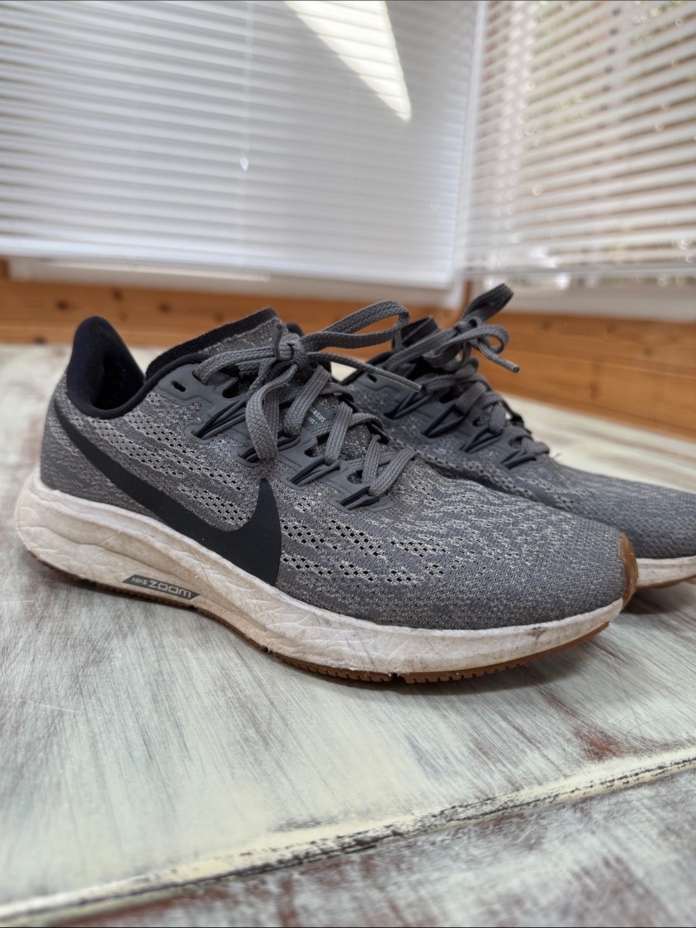 Nike Women’s Gray Knit Running Shoes with Black Swoosh